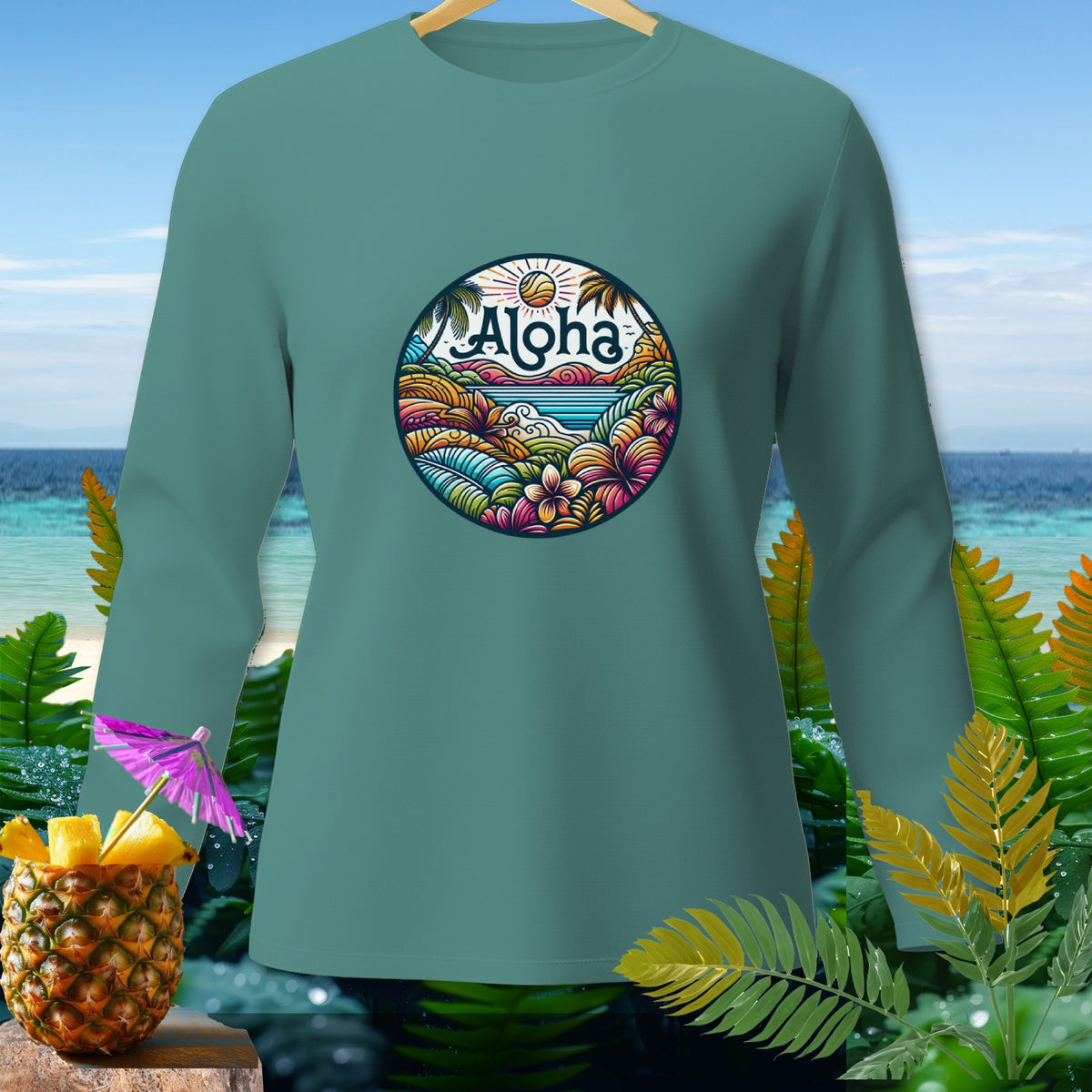 Teal long-sleeve shirt with circular Aloha beach scene graphic.