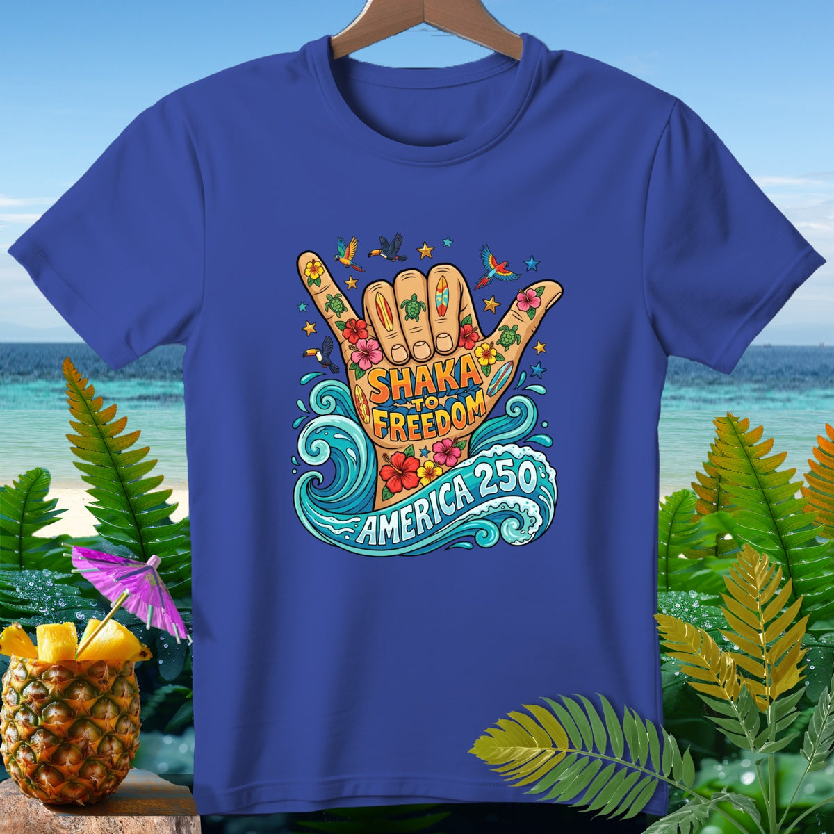 Blue t-shirt with 'Shaka to Freedom America 250' graphic featuring a hand.