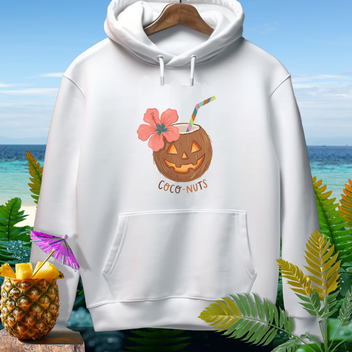 White hoodie with a cartoon coconut drink and pineapple illustration.