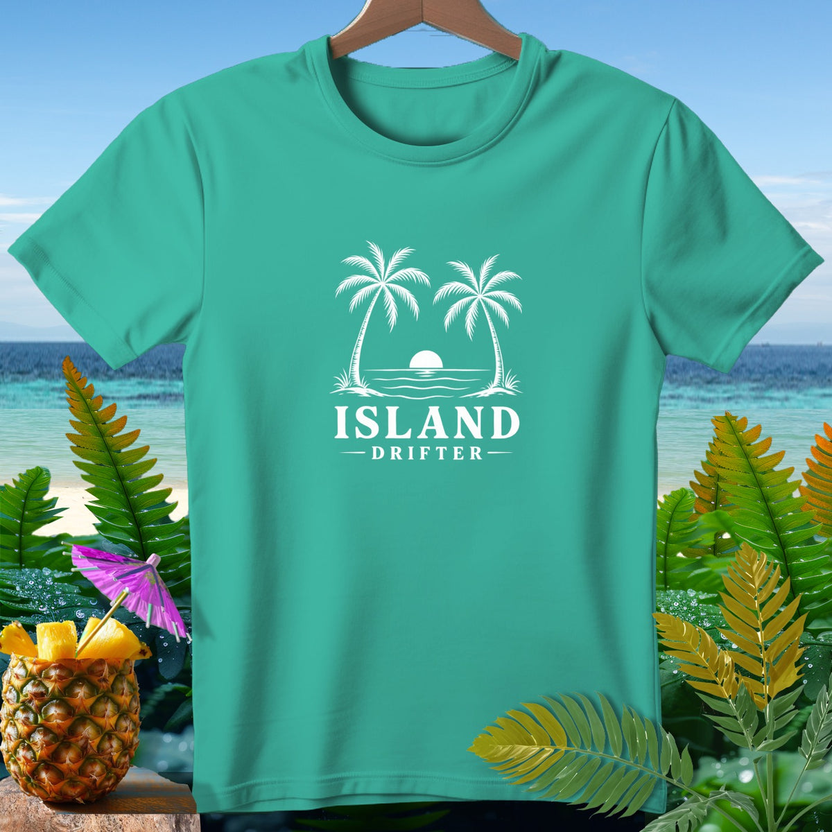 Teal t-shirt with white "ISLAND DRIFTER" text and palm trees graphic.