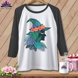 White baseball tee with dark sleeves featuring a floral witch hat silhouette design.