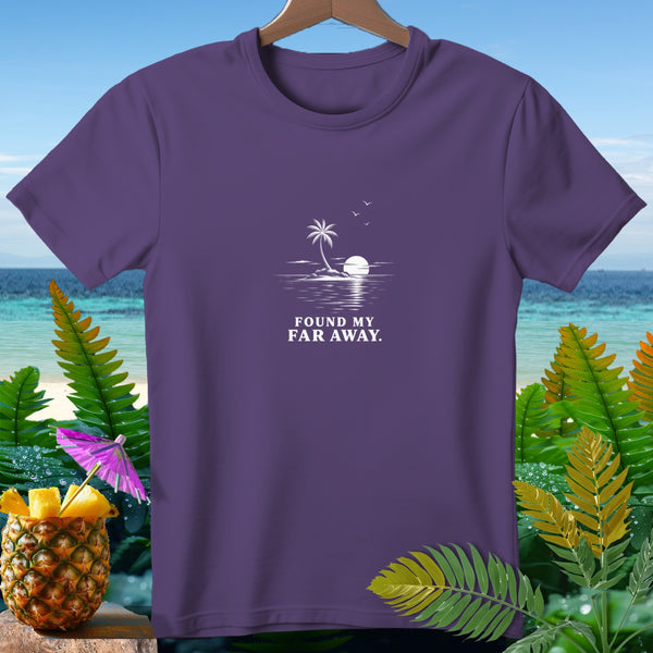Purple t-shirt with white graphic of a tropical island, sunset, and text "FOUND MY FAR AWAY."