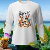 White long-sleeve shirt with cartoon kangaroos on beach chairs and text 
