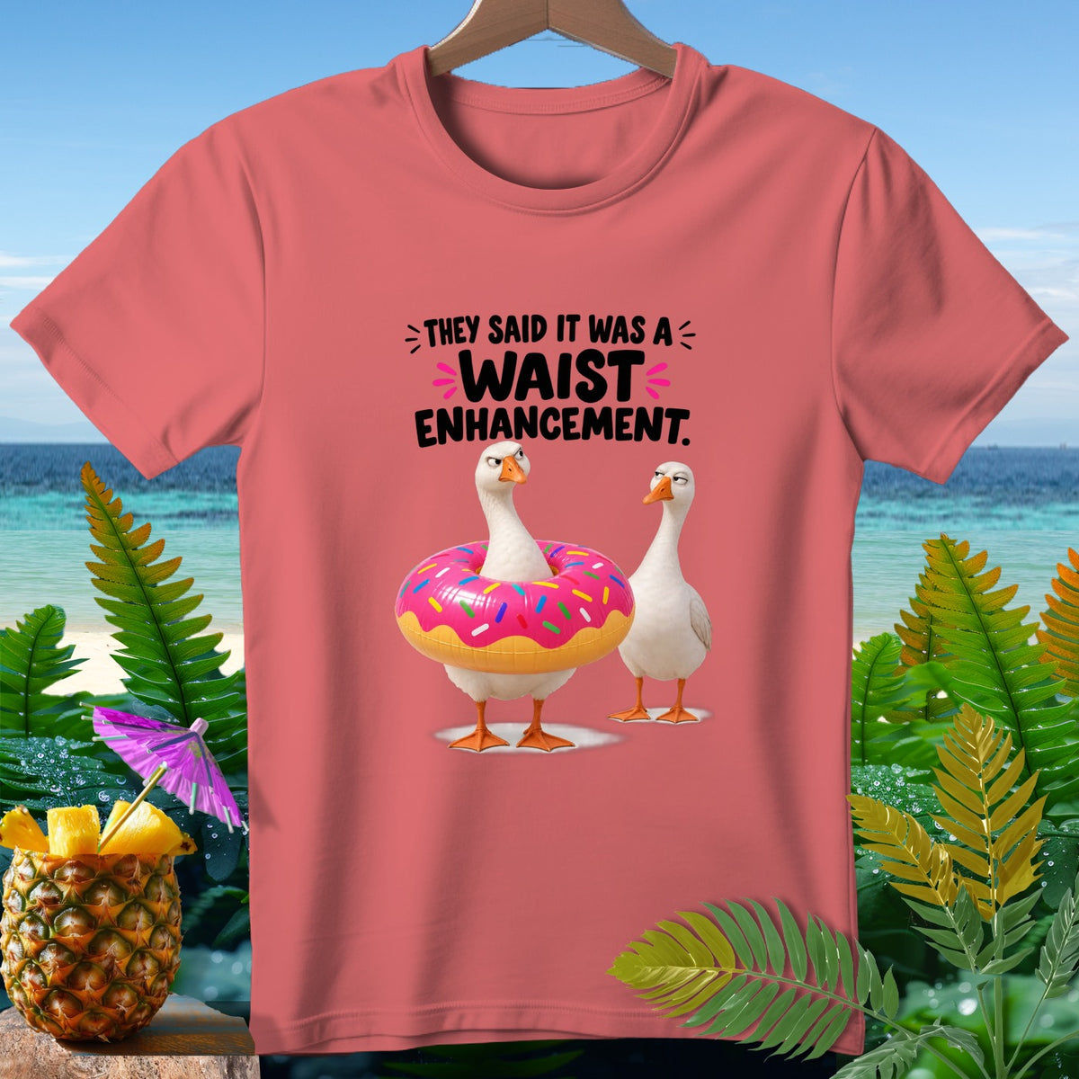 T-shirt with two geese, one wearing a donut float, and text "They said it was a waist enhancement."
