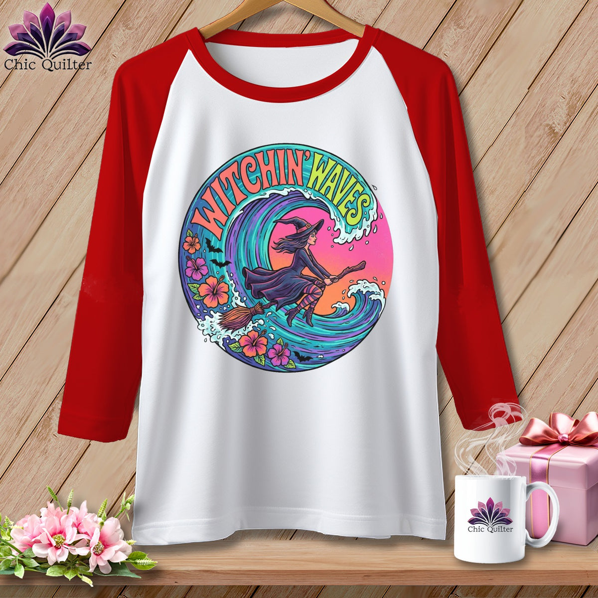 Baseball tee with "Witchin Waves" graphic featuring a witch on a broomstick flying over a wave.