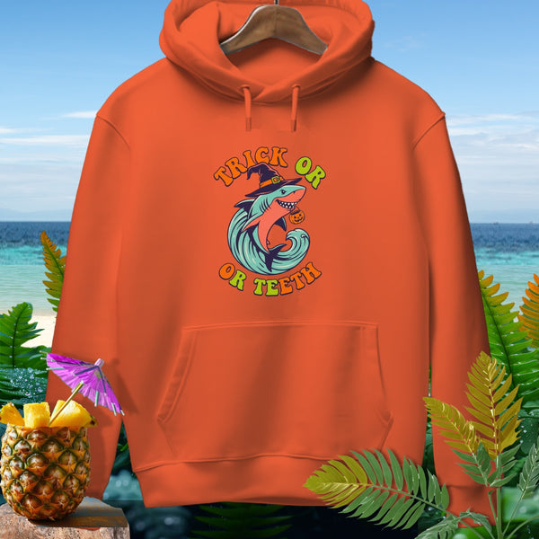 Orange hoodie with Halloween shark graphic saying "Trick or Teeth"