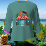 Teal long-sleeve shirt with two flamingos at a beach bar with drinks.
