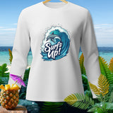 White long-sleeved shirt with a dolphin surfing on a wave graphic that reads 