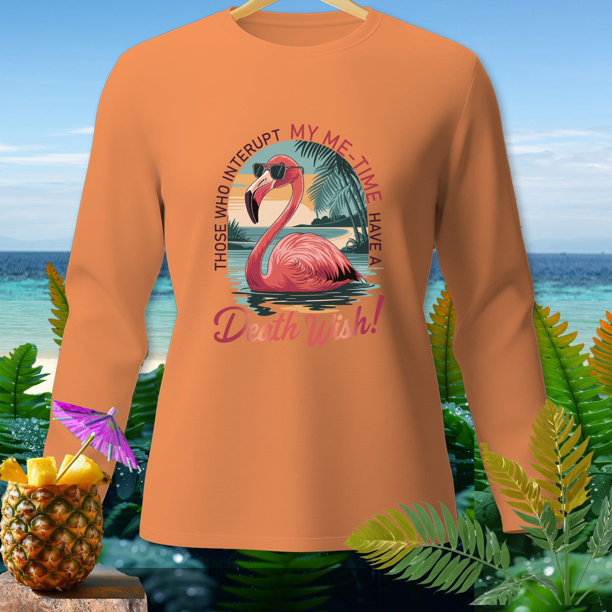 Orange long-sleeve shirt with a flamingo in sunglasses and text "Those who interrupt my me-time have a death wish!"