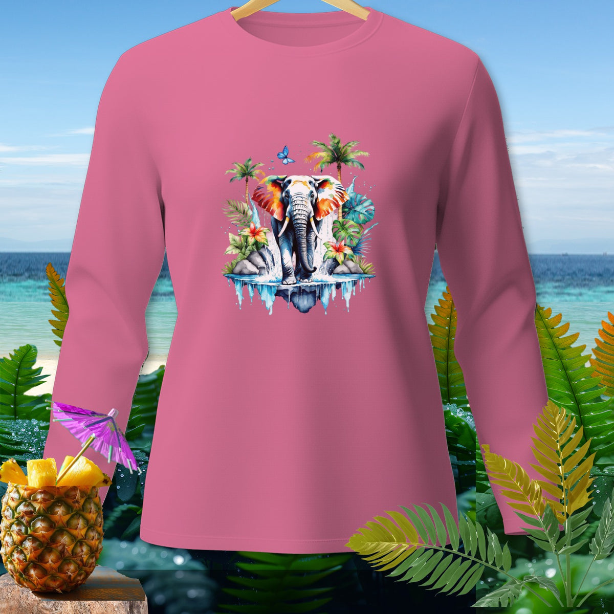 Pink long-sleeve shirt with an elephant and tropical scene graphic.