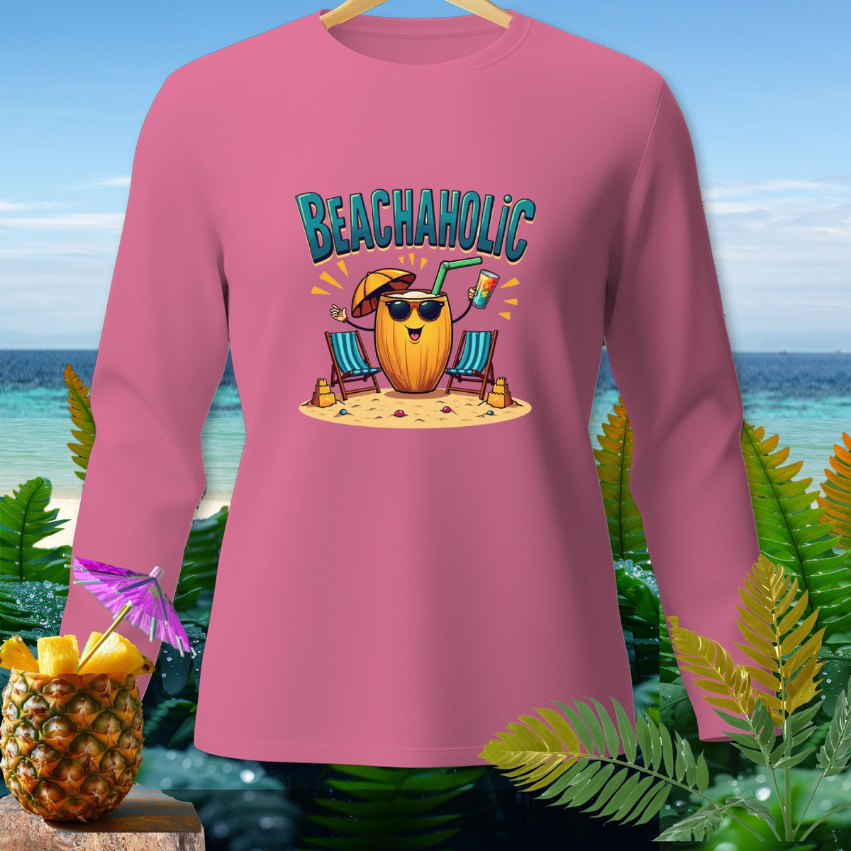 Pink long-sleeve shirt with "BEACHAHOLIC" text and cartoon coconut drink on beach.