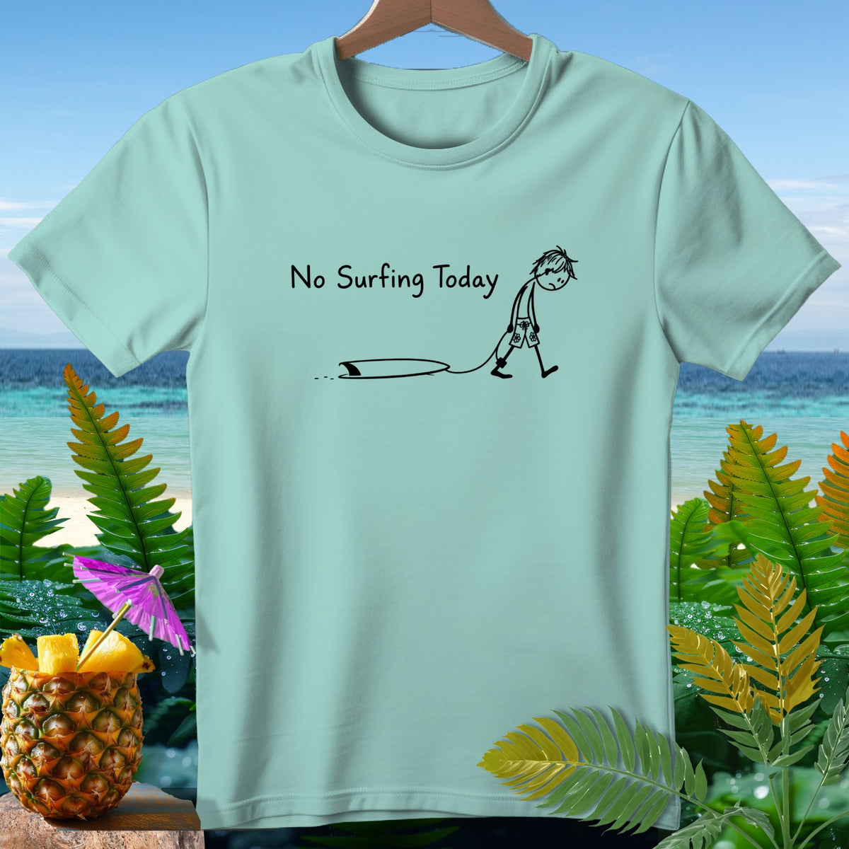 Light blue t-shirt with black text "No Surfing Today" and cartoon drawing.