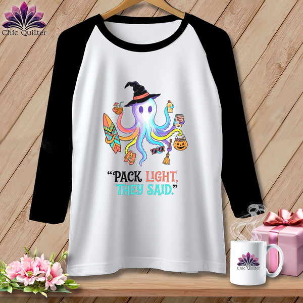 White raglan t-shirt with colorful octopus graphic and "Pack Light, They Said" text.