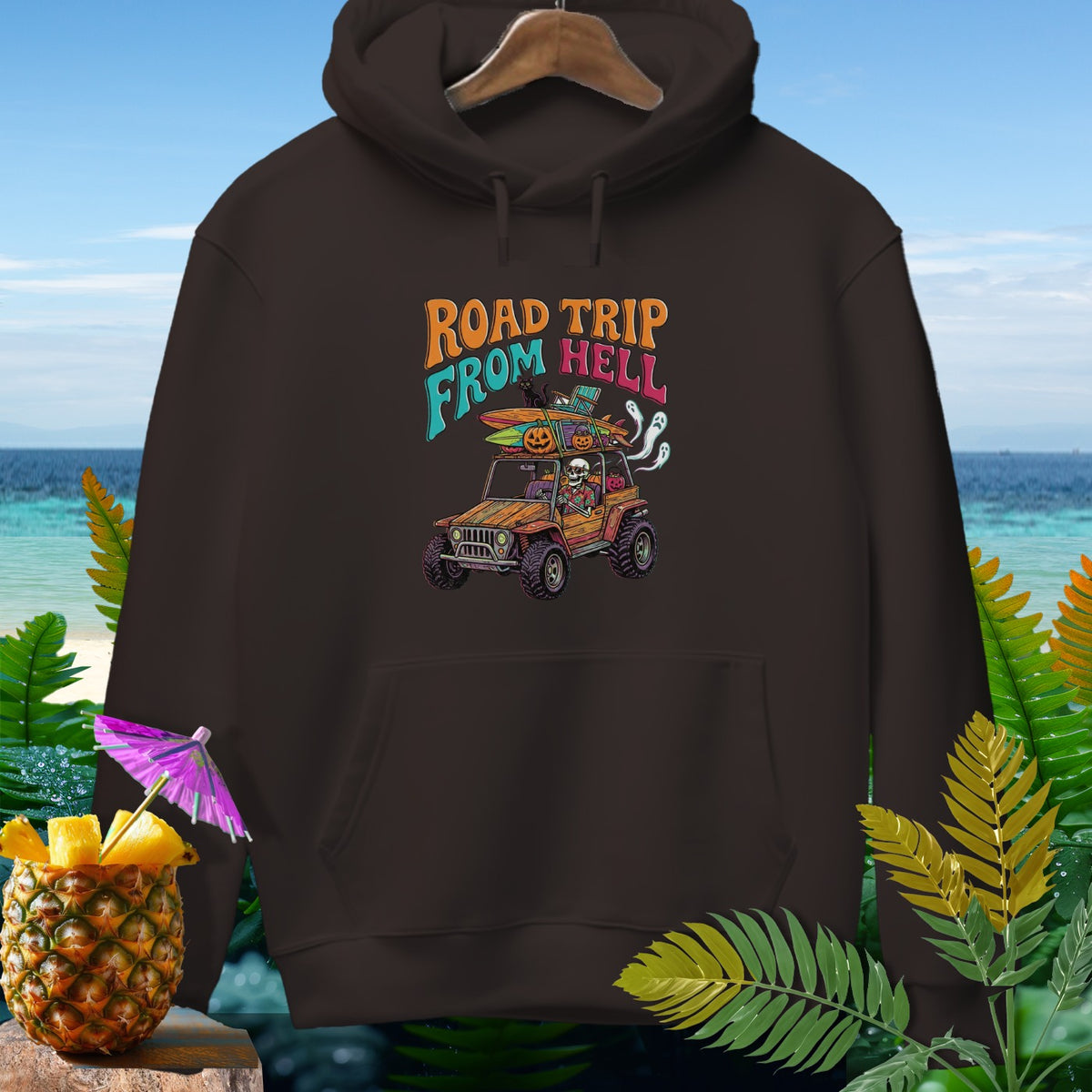 Dark brown hoodie with "Road Trip From Hell" graphic featuring a skeleton in a jeep.