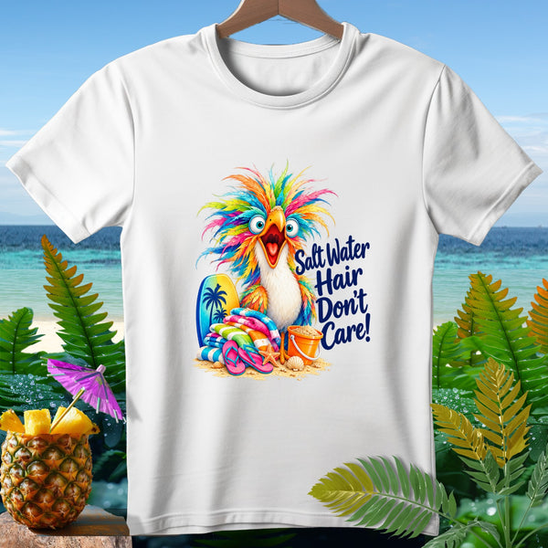 White t-shirt with colorful bird, surfboards, towels, and text "Salt Water Hair Don't Care!"