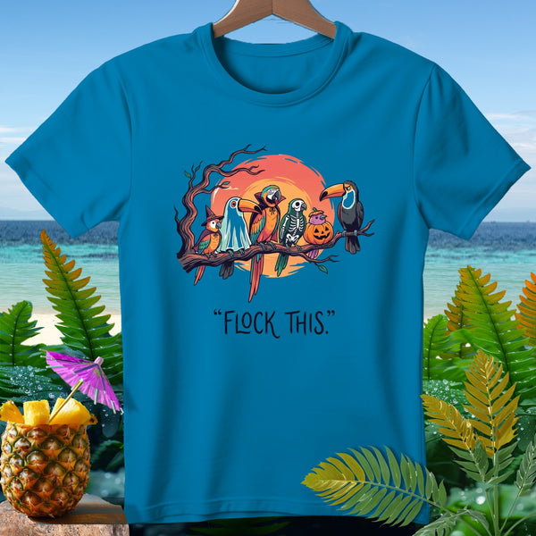 Turquoise t-shirt with Halloween parrots on a branch and "Flock This" text.