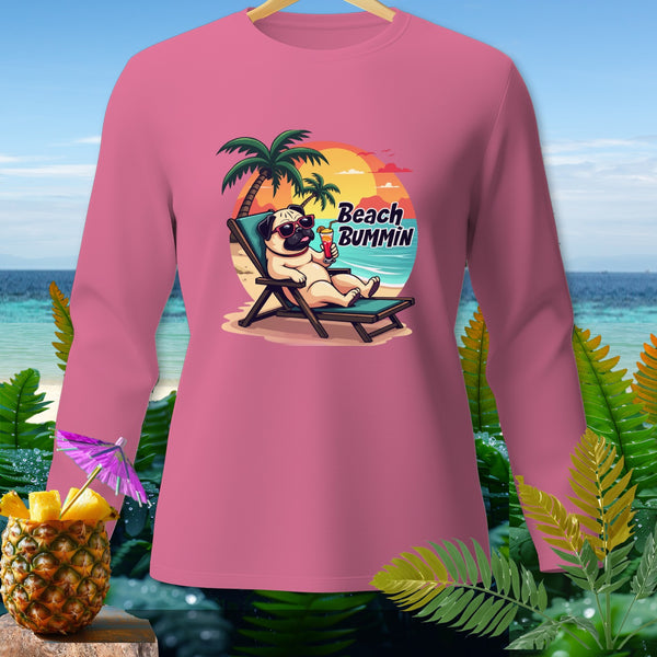 Pink long-sleeve shirt with cartoon pug relaxing on beach, "Beach Bummin" text.
