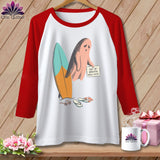 Baseball tee with ghost holding sign next to surfboard, sunglasses, and flip-flops.
