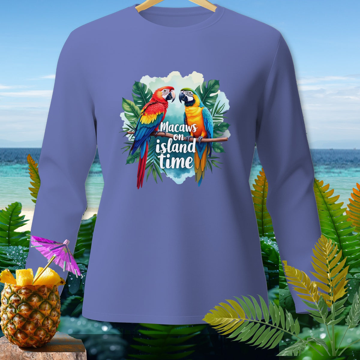 Long-sleeve shirt with macaws and text "Macaws on island time."