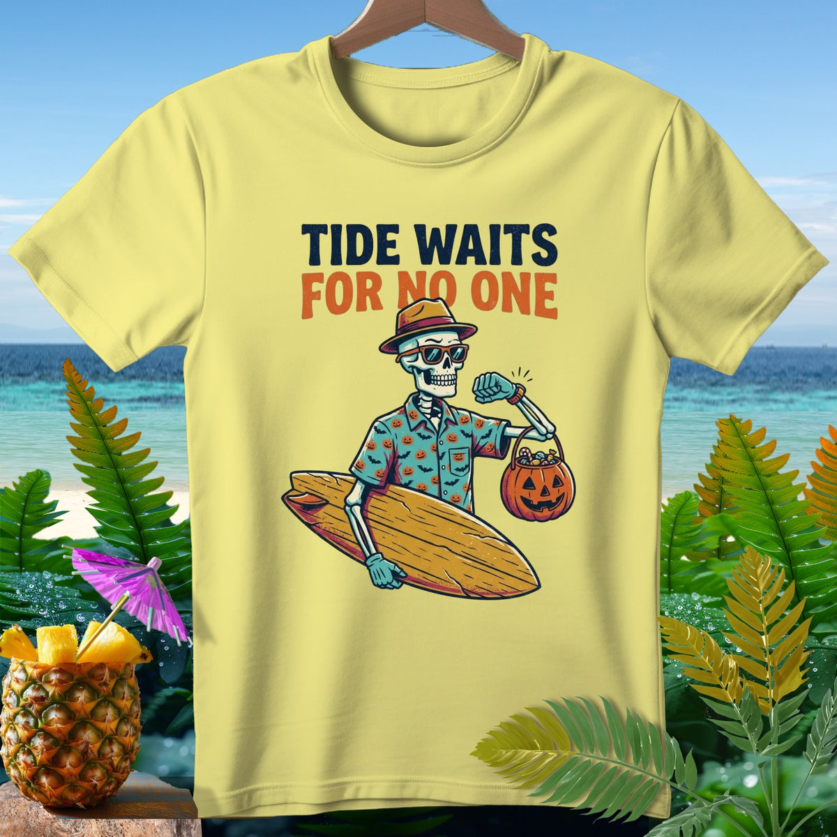 Skeleton with surfboard and pumpkin candy bucket, "Tide Waits For No One" text.