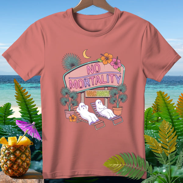 Peach t-shirt with neon sign showing ghosts on lounge chairs and text "No Mortality Vacancy".
