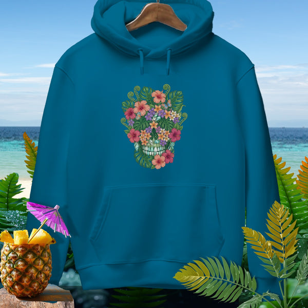 Teal hoodie with floral skull graphic, pineapple with umbrella, and beach background.