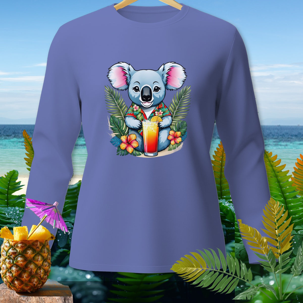 Long-sleeve shirt with cartoon koala holding a tropical drink and pineapple with umbrella.