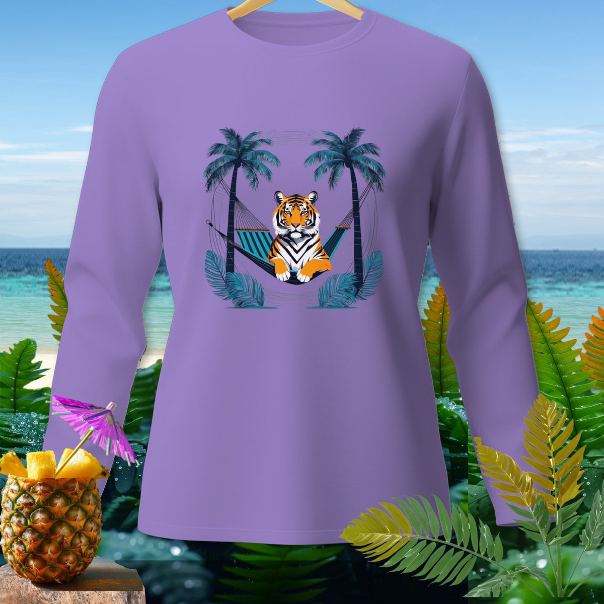 Lavender long-sleeve shirt with a tiger lounging in a hammock between palm trees.