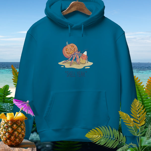 Teal hoodie with a graphic of a hermit crab, pumpkin, and candy corn saying "SHELL YEAH."