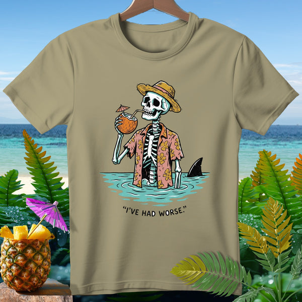 Skeleton in Hawaiian shirt drinks coconut, shark fin behind, with text "I'VE HAD WORSE."