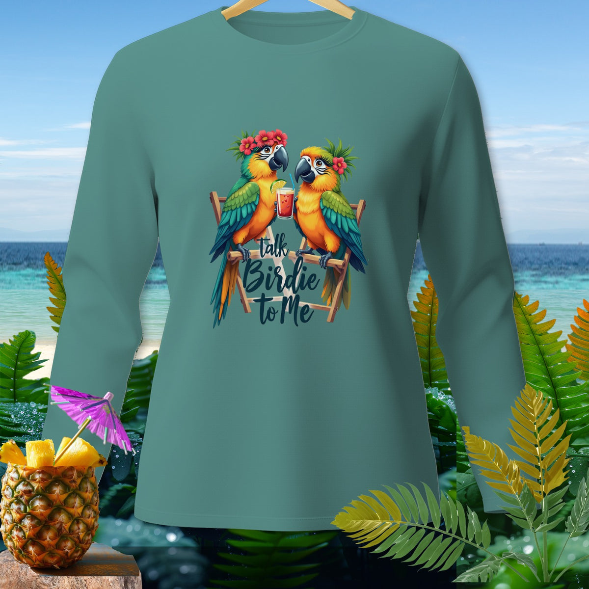Long sleeve teal shirt with two parrots and "Talk Birdie to Me" text.