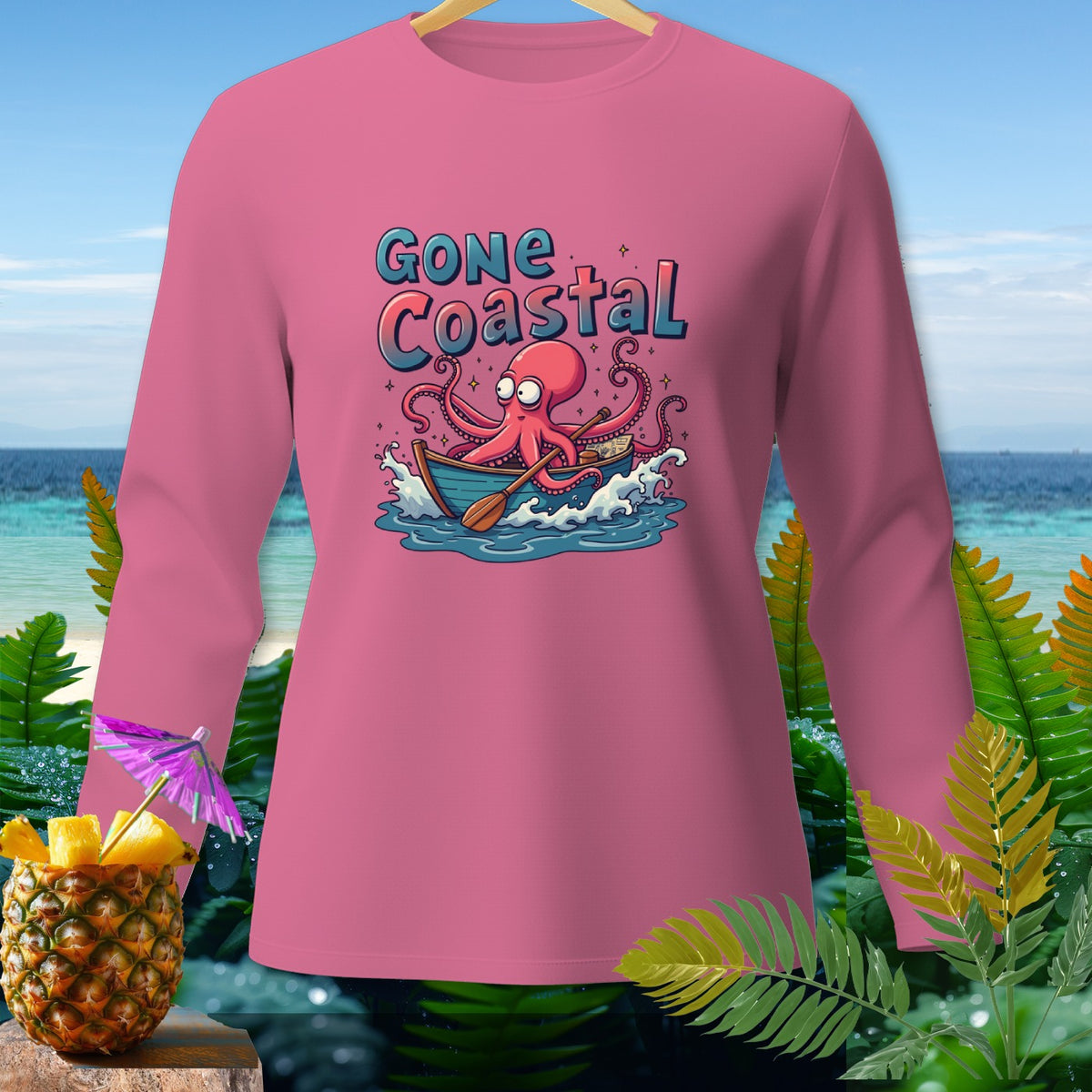 Pink long-sleeve shirt with octopus in a boat graphic and "Gone Coastal" text.