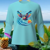 Light blue long-sleeve shirt with a colorful owl graphic and tropical background.