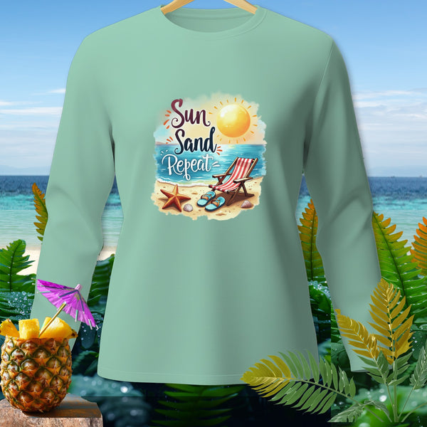 Light green long-sleeve shirt with "Sun Sand Repeat" beach graphic.