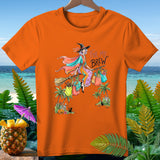 Orange t-shirt with witch flying on broomstick, text 