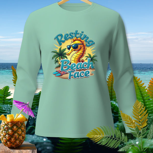 Long sleeve shirt with a seahorse graphic saying "Resting Beach Face".
