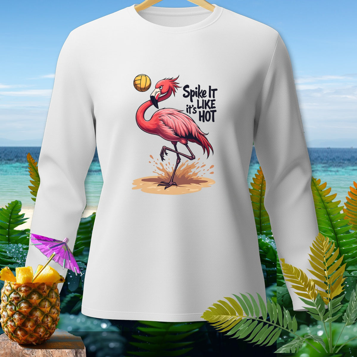 White long-sleeved shirt with a cartoon flamingo playing volleyball and text "Spike It It's Like Hot".
