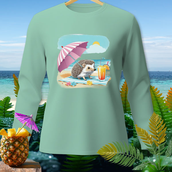 Mint green long-sleeve shirt with a beach scene featuring a hedgehog under an umbrella.