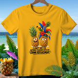 Yellow t-shirt with two cartoon pineapples, one happy, one sad, with text 