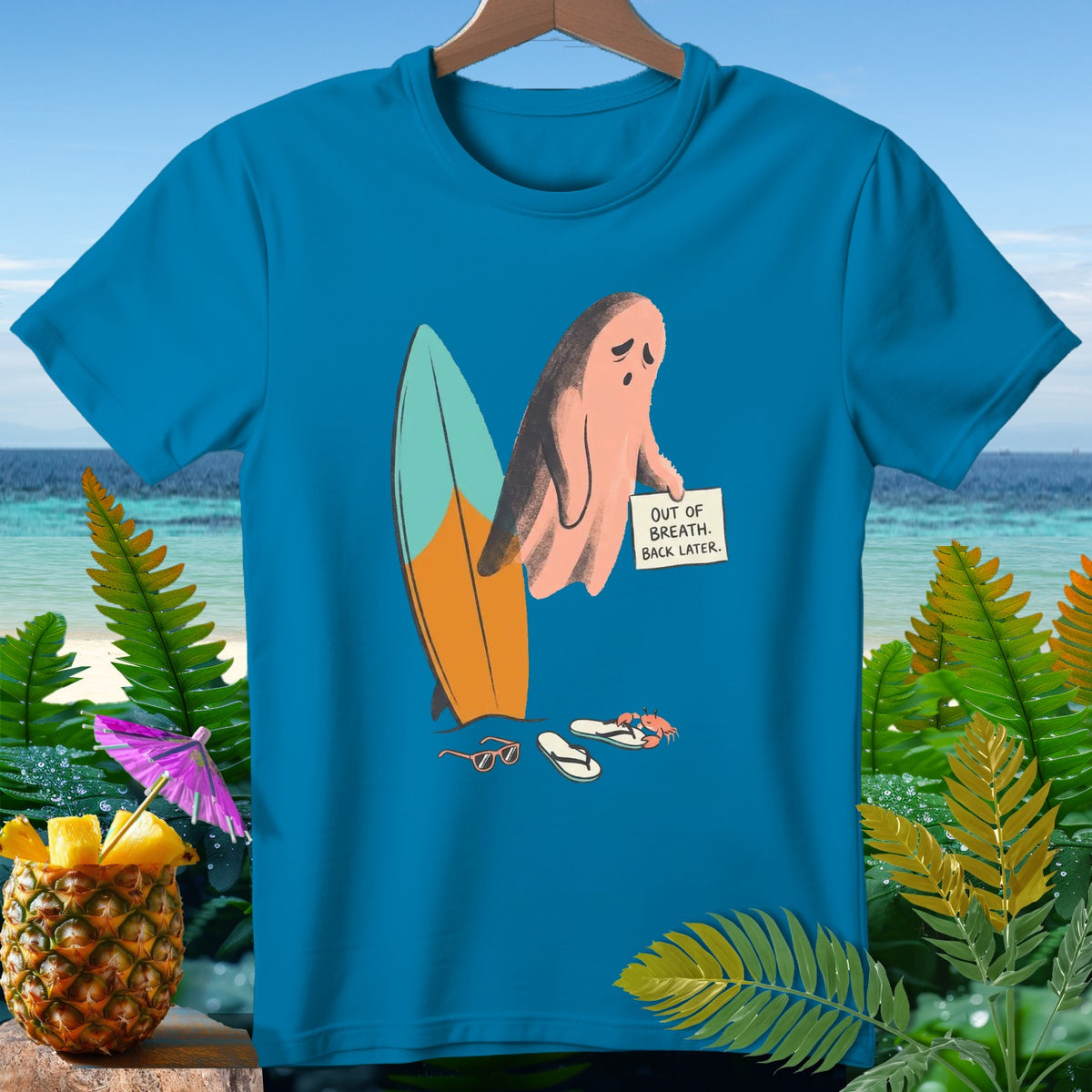 Turquoise t-shirt with ghost, surfboard, and "Out of Breath" sign.