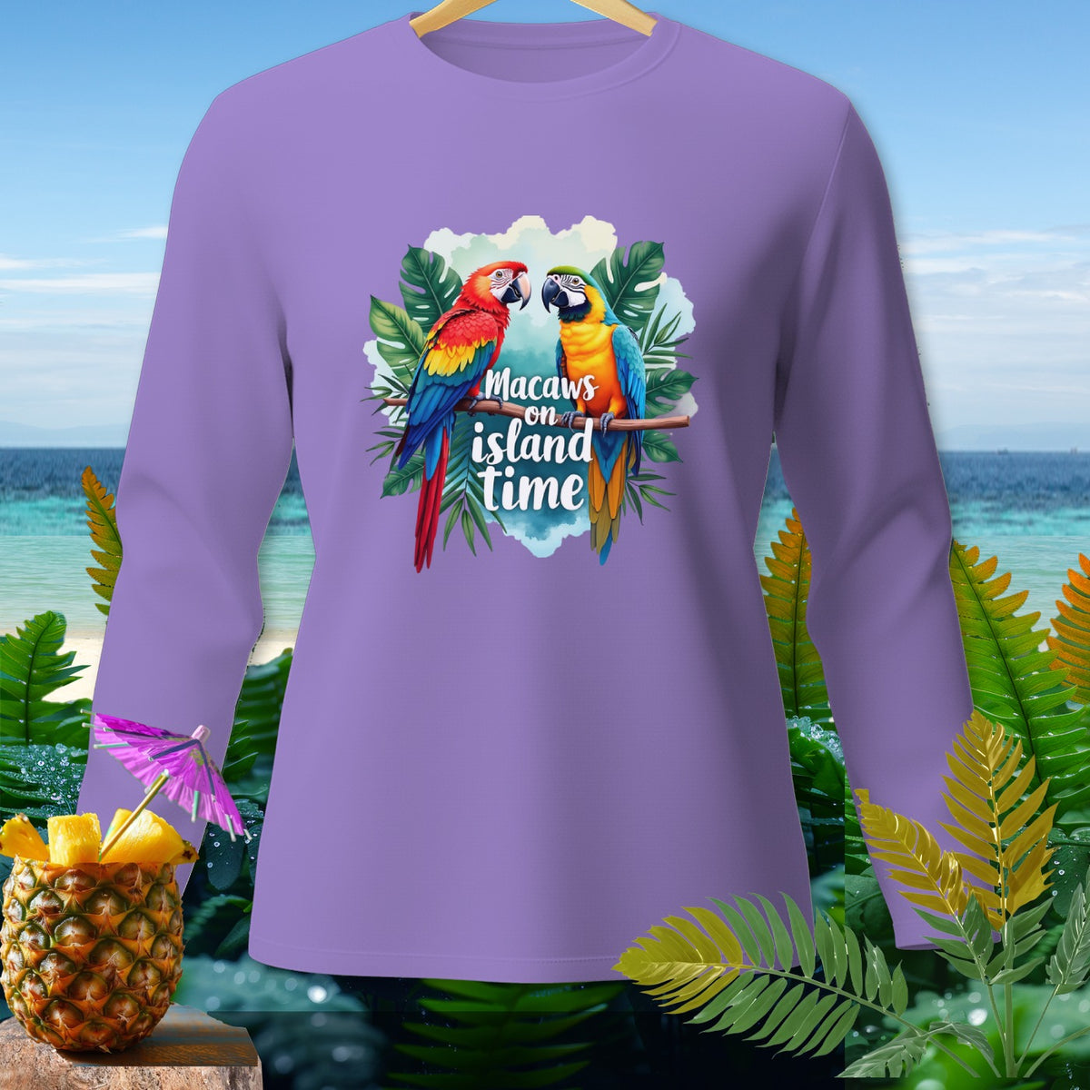 Purple long sleeve shirt with macaws and text "Macaws on island time" design.