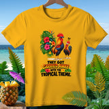 Yellow t-shirt with roosters and tropical flowers, text 