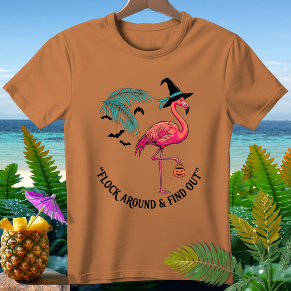 Orange t-shirt with flamingo in witch hat and "Flock Around & Find Out" text.