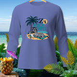 Long sleeve shirt with a zebra reading on a beach with 