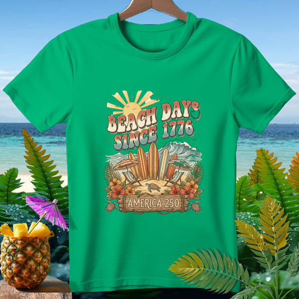 Green t-shirt with "Beach Days Since 1776 America 250" graphic and beach scene.