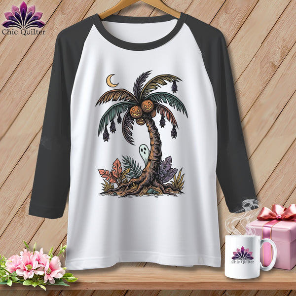 White t-shirt with graphic of a palm tree with pumpkins, bats, and a ghost.