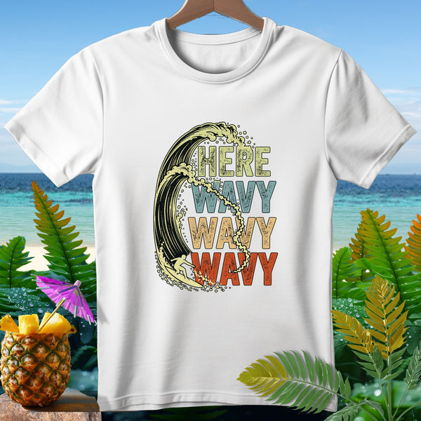 White t-shirt with "HERE WAVY WAVY WAVY" text and surfer in a wave graphic.