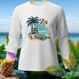 White long-sleeve shirt with graphic of zebra reading on beach with text 