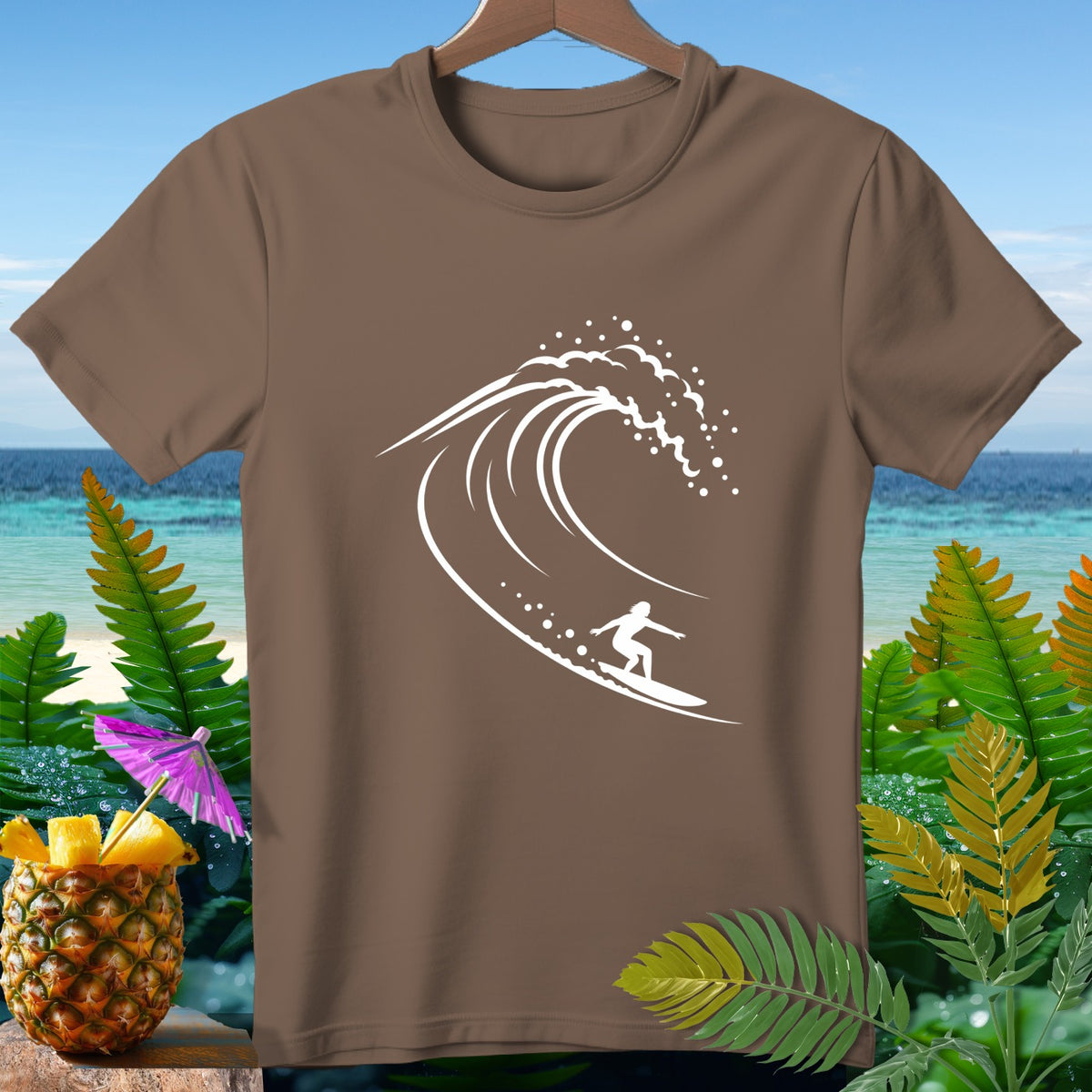 Brown t-shirt with white surfer on a wave graphic.