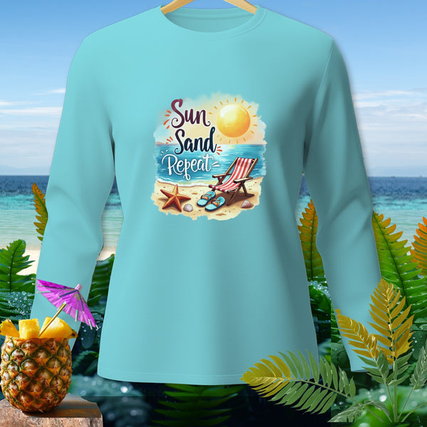 Light blue long-sleeve shirt with "Sun Sand Repeat" beach graphic.
